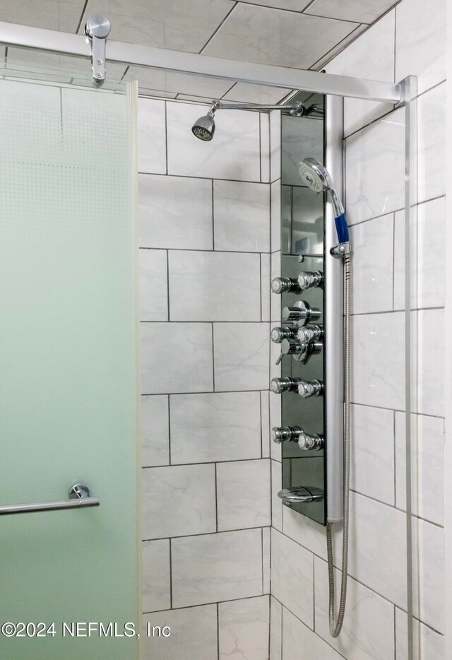 bathroom with an enclosed shower