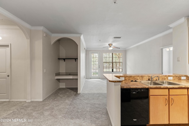 kitchen featuring ornamental molding, light brown cabinets, dishwasher, and light colored carpet