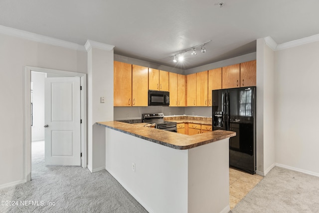 kitchen featuring black appliances, kitchen peninsula, rail lighting, light carpet, and ornamental molding