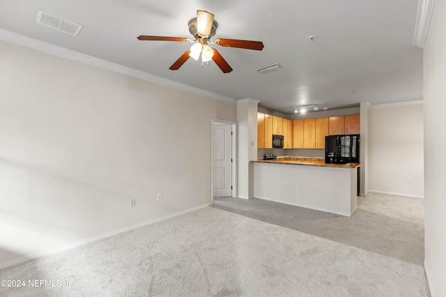 unfurnished living room featuring light carpet, crown molding, and ceiling fan