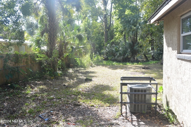 view of yard with central AC