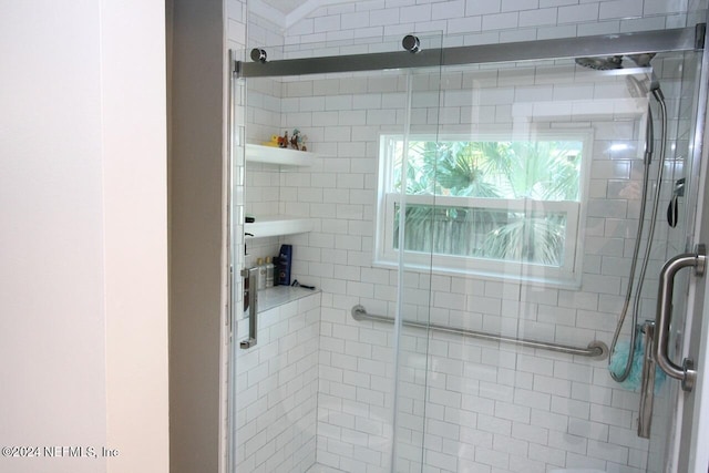 bathroom featuring an enclosed shower