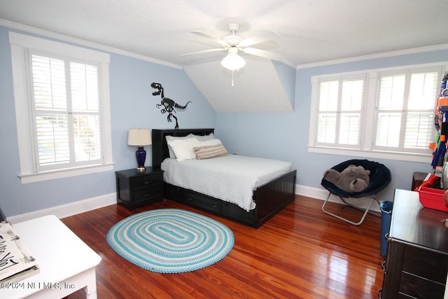 bedroom with ceiling fan, multiple windows, and dark hardwood / wood-style flooring