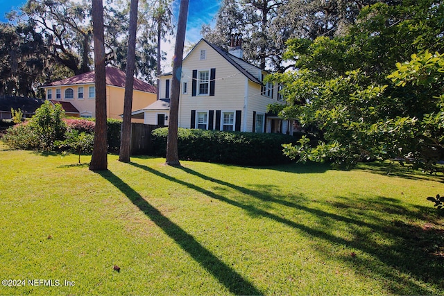 exterior space with a front yard