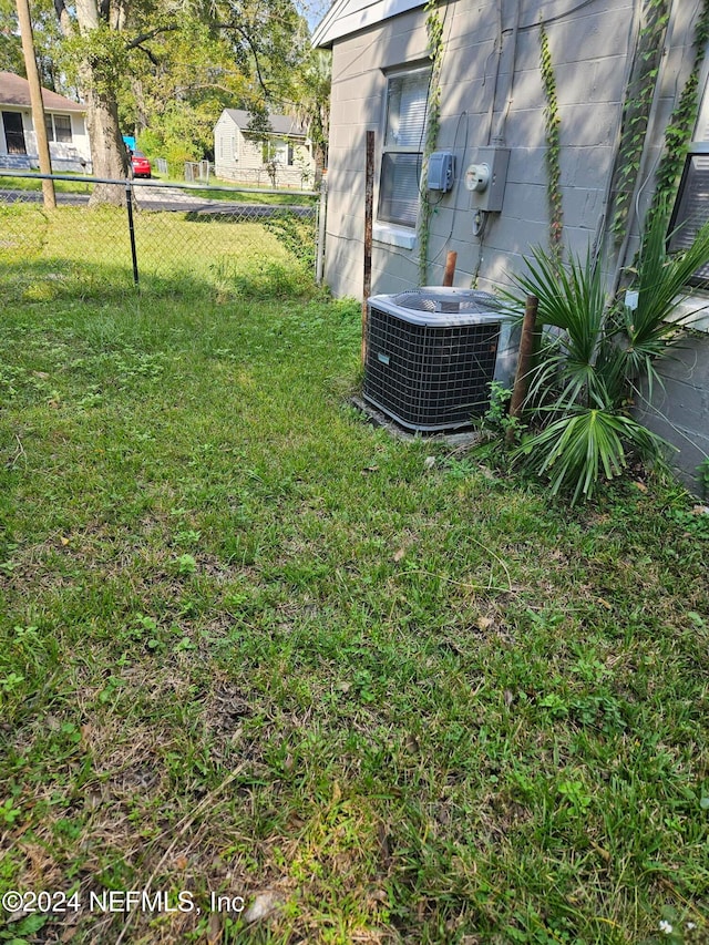 view of yard featuring central AC