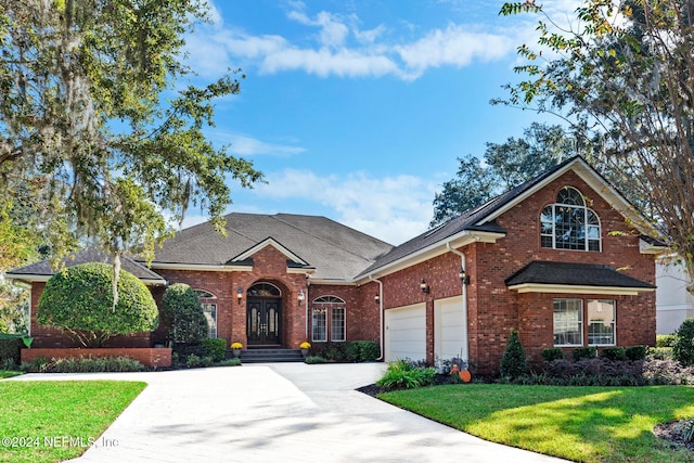 front facade with a front lawn