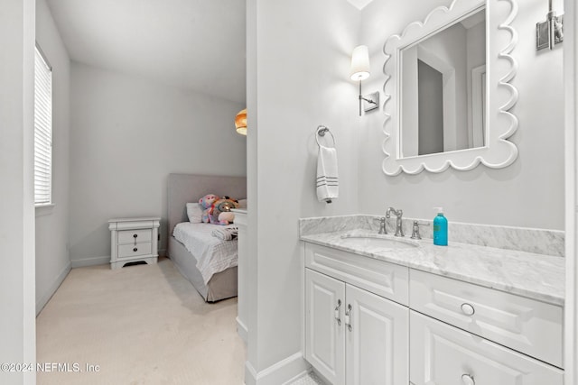 bathroom with vanity and plenty of natural light