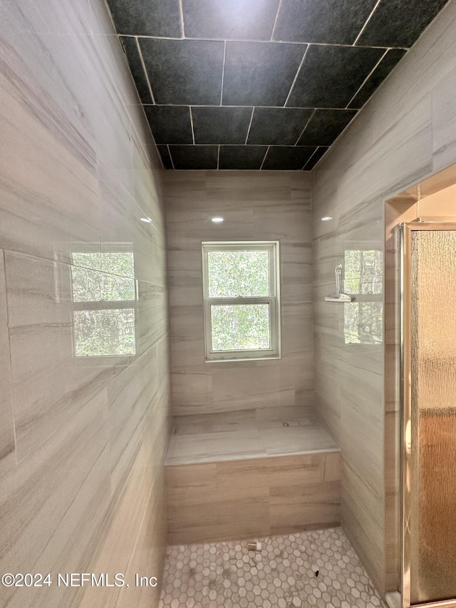full bathroom featuring a stall shower