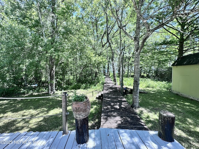 deck featuring a lawn