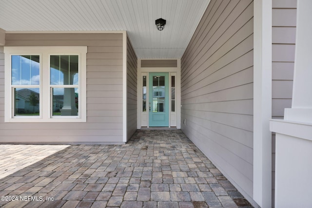 doorway to property featuring a patio