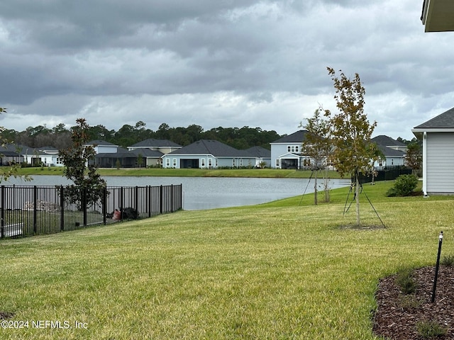 view of yard with a water view