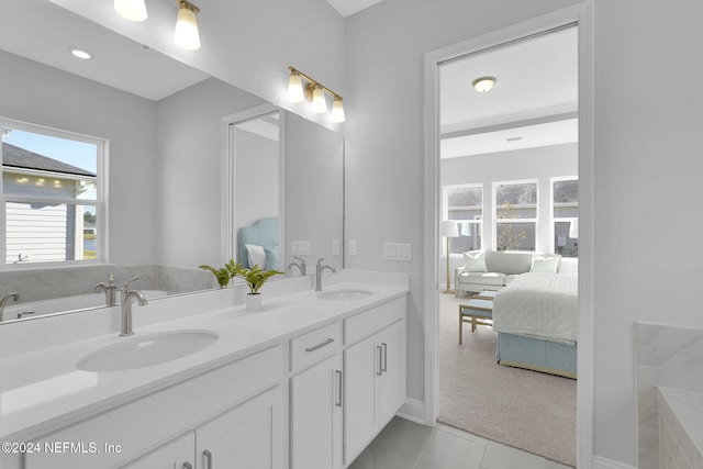 bathroom with tile patterned flooring and vanity