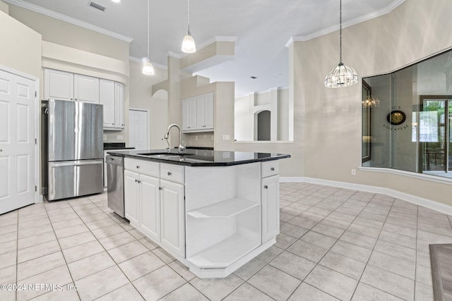 kitchen with white cabinetry, a chandelier, a kitchen island with sink, and stainless steel appliances