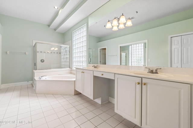 bathroom featuring vanity, shower with separate bathtub, and tile patterned flooring