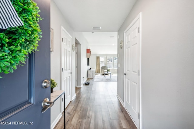 hall featuring hardwood / wood-style flooring