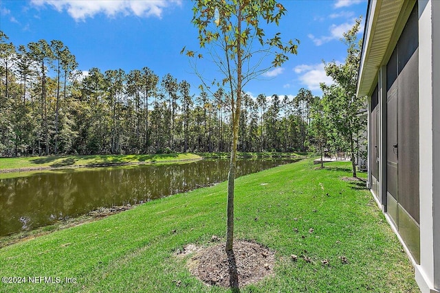 view of yard with a water view