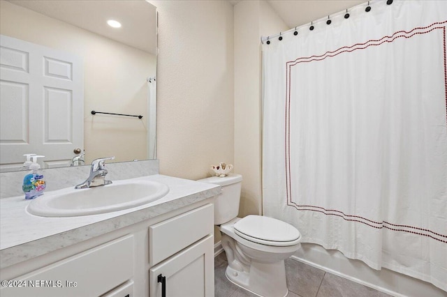 full bathroom featuring vanity, toilet, shower / bathtub combination with curtain, and tile patterned flooring