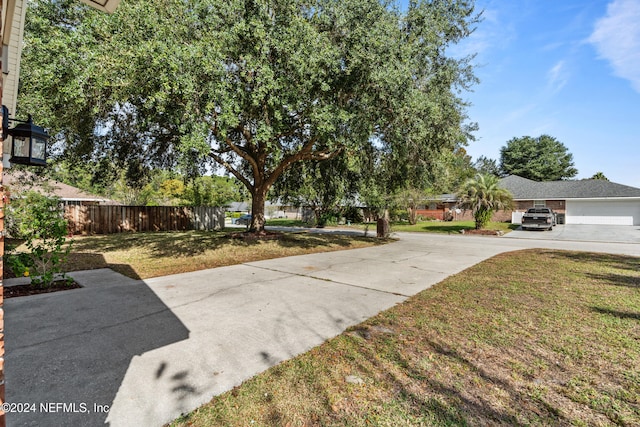 view of yard featuring a garage