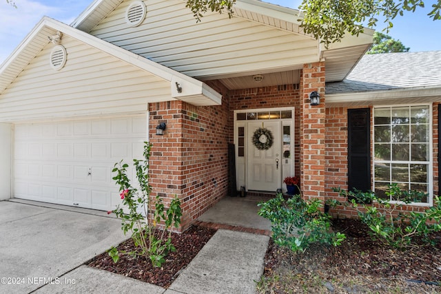 entrance to property with a garage