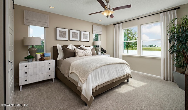 bedroom featuring carpet flooring and ceiling fan