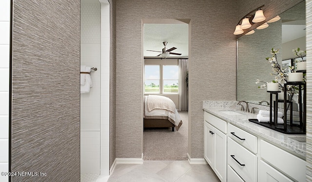 bathroom with vanity, tile patterned flooring, and ceiling fan