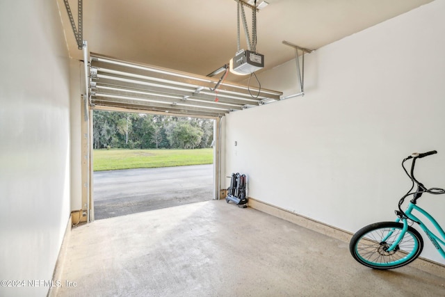 garage featuring a garage door opener