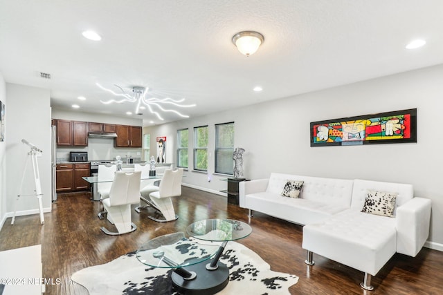 living room with dark hardwood / wood-style floors