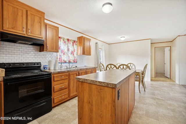 kitchen with tasteful backsplash, electric range, a kitchen island, crown molding, and sink