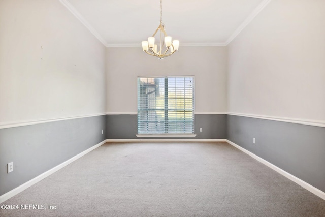 empty room featuring crown molding, carpet flooring, and an inviting chandelier