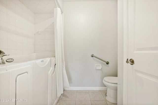 bathroom featuring toilet, shower / bathtub combination with curtain, and tile patterned floors