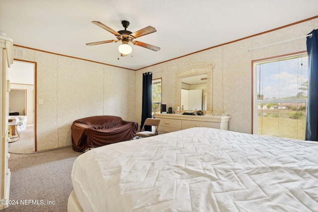 carpeted bedroom featuring a closet, ceiling fan, and crown molding