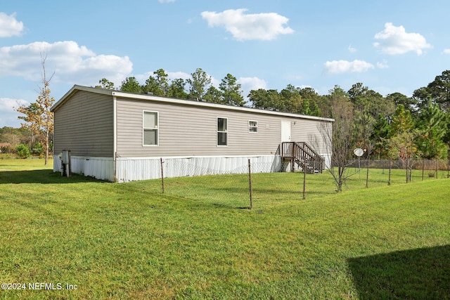 exterior space with a yard