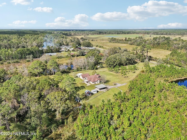 birds eye view of property featuring a rural view