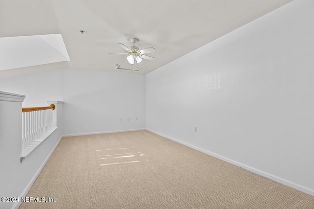 carpeted empty room with ceiling fan