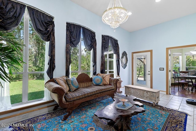 living room featuring light hardwood / wood-style flooring and a chandelier