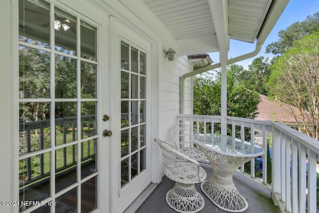 balcony featuring french doors