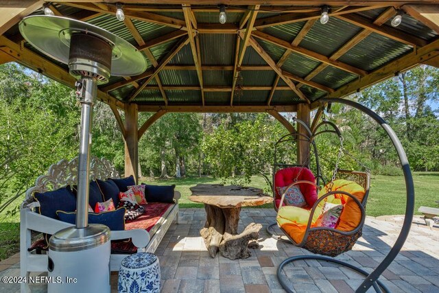 view of patio / terrace featuring a gazebo and outdoor lounge area