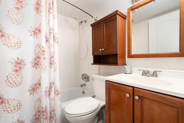 full bathroom featuring toilet, vanity, and shower / tub combo