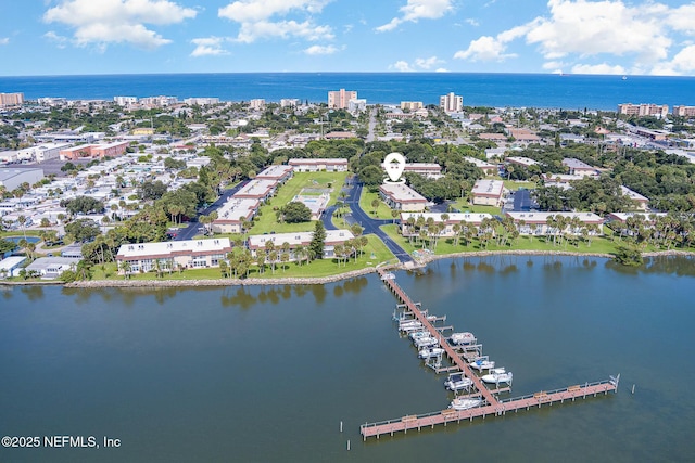 birds eye view of property featuring a water view