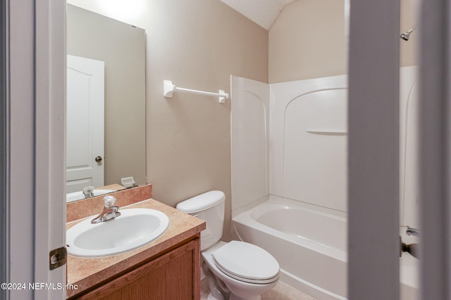 full bathroom featuring tub / shower combination, a textured ceiling, vanity, lofted ceiling, and toilet