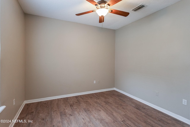 unfurnished room with hardwood / wood-style flooring, ceiling fan, and a textured ceiling