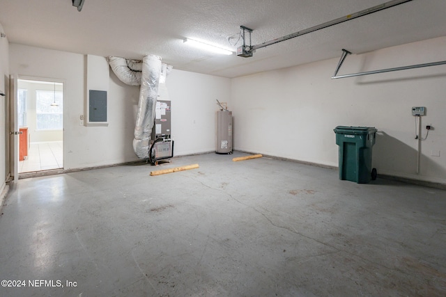 garage featuring electric panel, a garage door opener, water heater, and heating unit