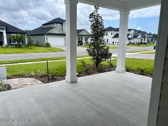 view of patio with a garage