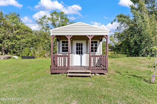 view of outdoor structure with a yard