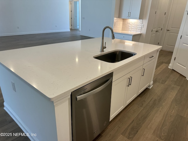 206 Holly Ridge Way, Saint Augustine, FL 32092 - kitchen featuring dishwasher, a sink, dark wood-style flooring, white cabinets, and a kitchen island with sink