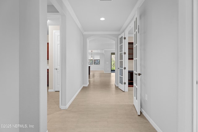 hallway with crown molding