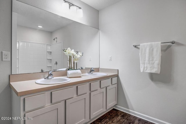 bathroom featuring vanity and hardwood / wood-style flooring