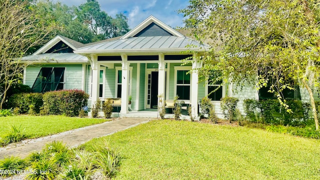 view of front of home with a front yard