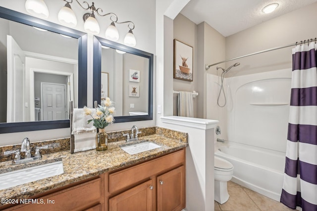 full bathroom with shower / bath combination with curtain, a textured ceiling, toilet, vanity, and tile patterned flooring