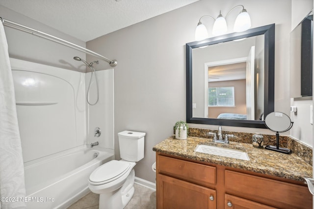 full bathroom with shower / bath combination with curtain, a textured ceiling, toilet, vanity, and tile patterned floors